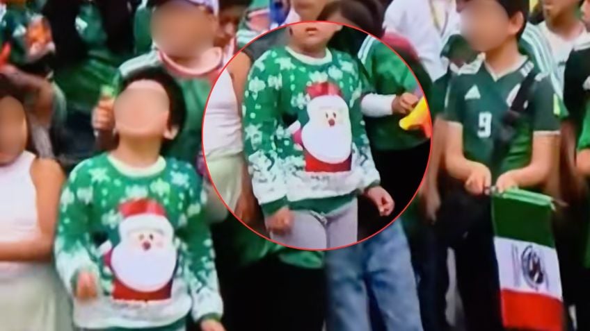 Niño se hace viral por usar suéter de Navidad a falta de playera de la selección mexicana en la Copa Mundial 2026 Niño se hace viral por usar suéter de Navidad a falta de playera de la selección mexicana en la Copa Mundial 2026